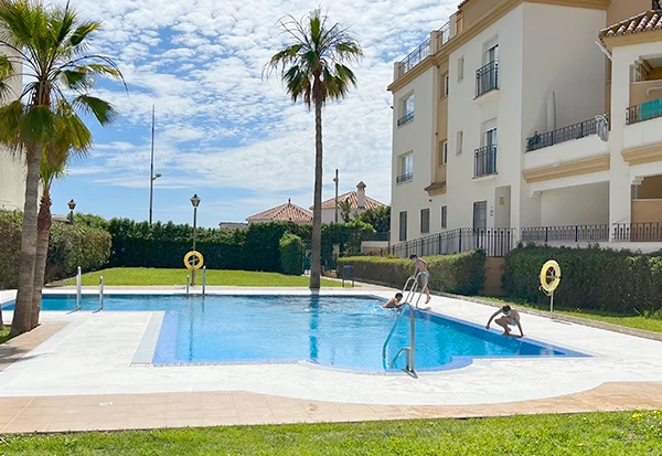 Swimming pool at a rental house in Torrox Costa, Spain, with a sunny atmosphere