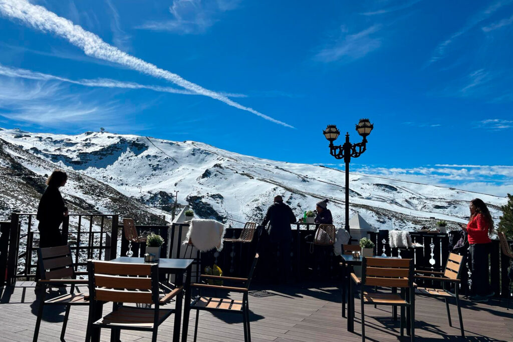 View of Sierra Nevada in Spain, highlighting the snow-covered mountains and the mountainous landscape
